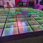 LED dance floor with colorful lighting at an event venue.