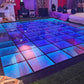 LED dance floor with colorful lighting at an event venue.