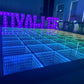 LED dance floor with colorful lighting and 'FESTIVAL' letters in the background.